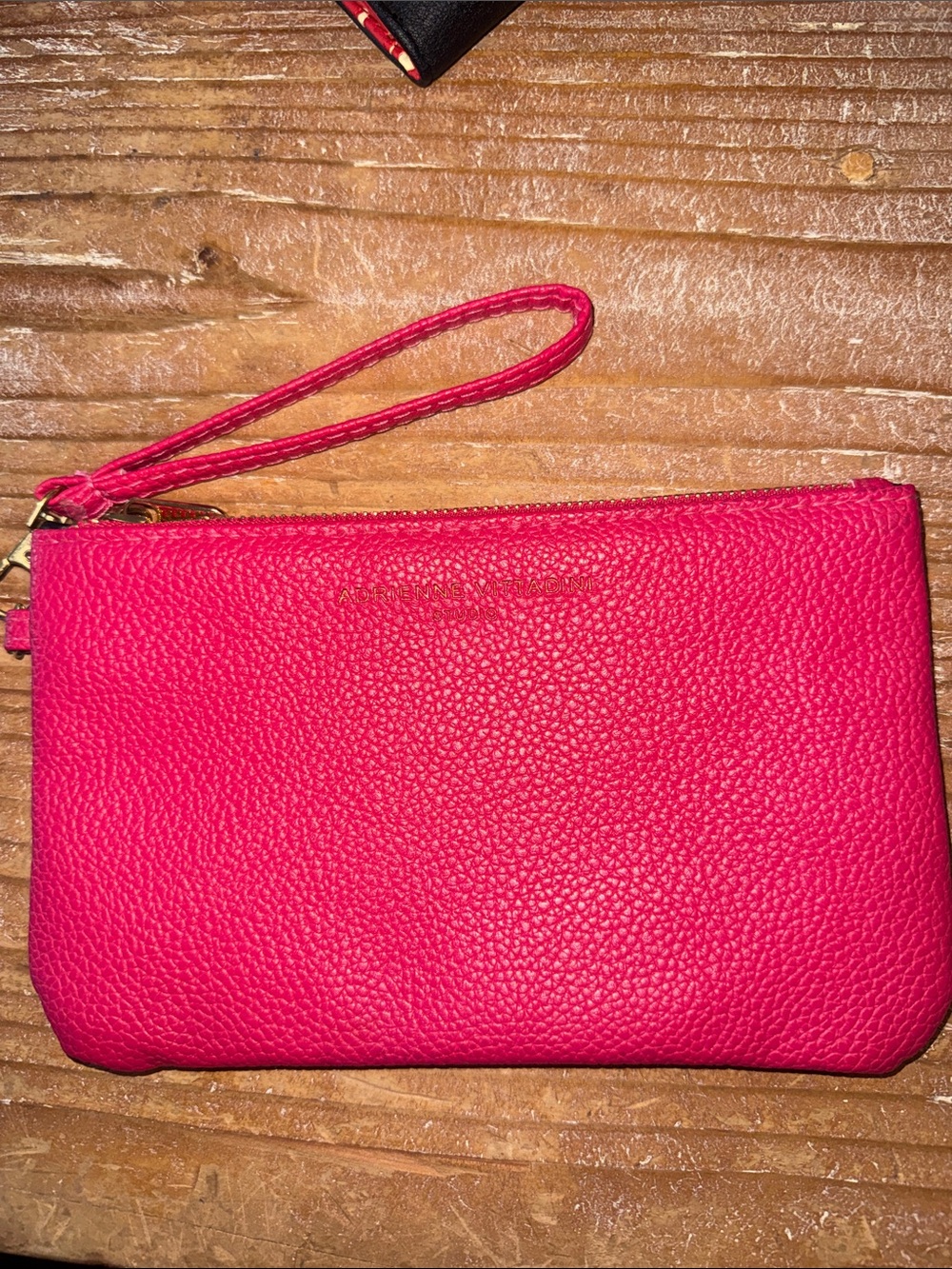Adrienne Vittadini pink wristlet.